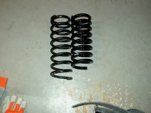 Comparison of the stock spring with the uncut 620 drop spring.